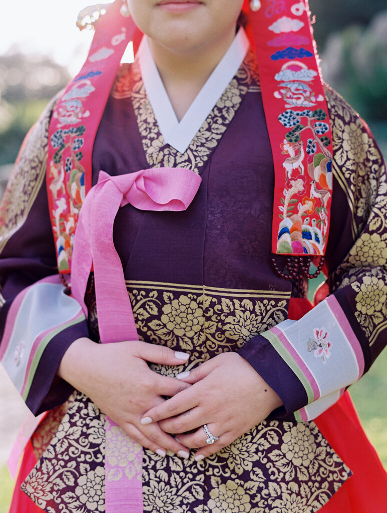 Korean wedding ceremony with bride in traditional attire.