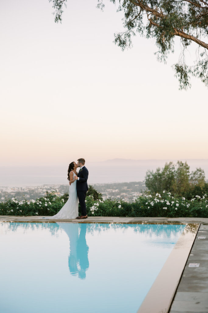 Bride and Groom at Belmond El Encanto Hotel. Photography by Natalie Bray. Sunset photo by pool.