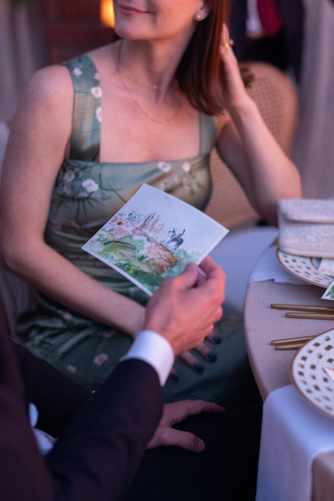 Wedding Seating chart with watercolored landscape postcards and vellum envelopes as escort cards. 