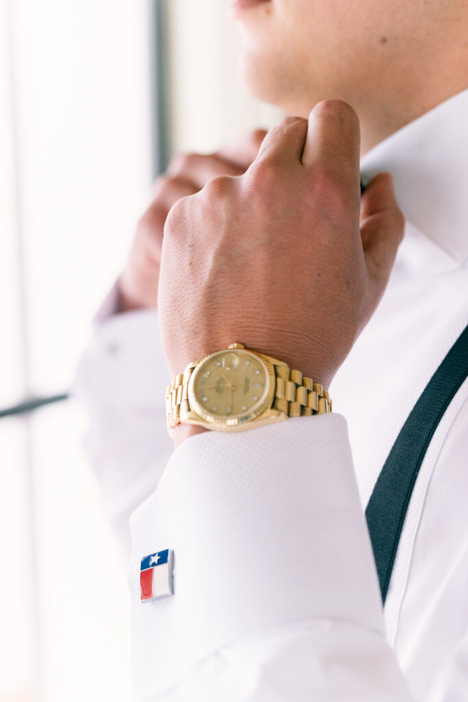 Groom getting ready with Rolex watch