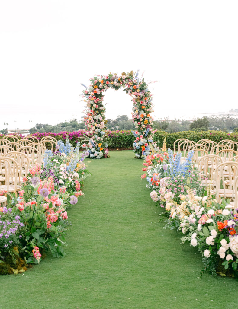 Luxurious wedding at the Montecito Club with colorful flowers. Santa Barbara Wedding Planner. Best Overall Vendor in Santa Barbara