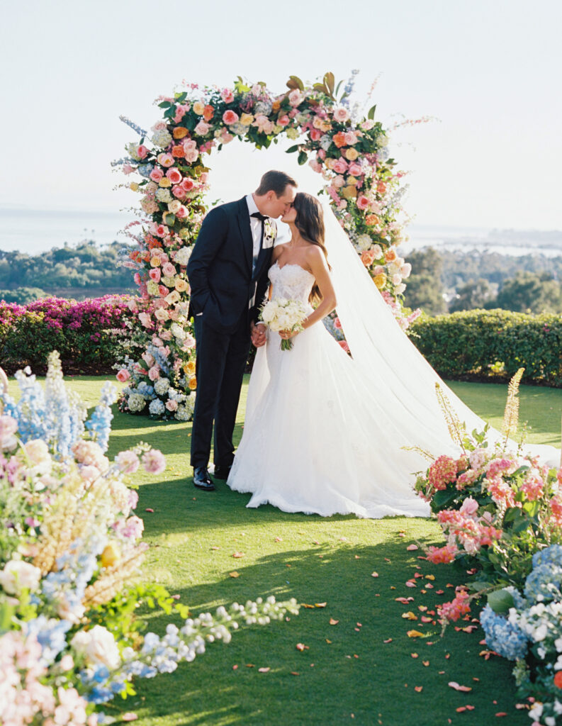 Colorful Floral-filled Wedding Ceremony at The Montecito Country Club. Shannon Skloss wedding photography