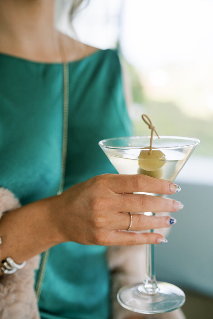 wedding cocktail hour martini with beautiful nails