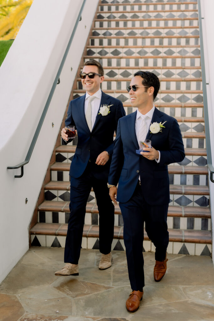 Two grooms at cocktail hour. Wedding at Hotel Californian. Gay wedding in Santa Barbara.