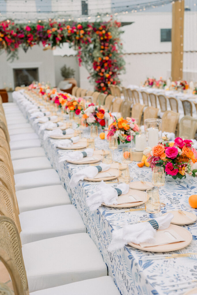 Destination Wedding Welcome Party at Hotel Californian in Santa Barbara, Ca. With colorful flowers, patterned linens, and citrus details.