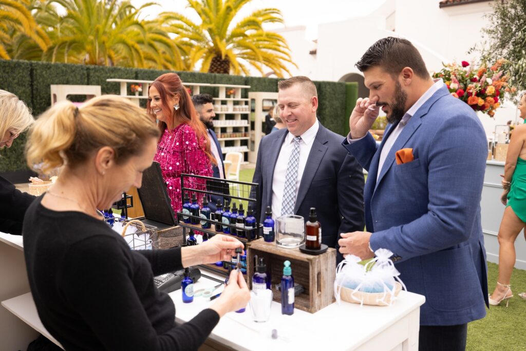 Fragrance bar at wedding welcome party for guests to create their own fragrance