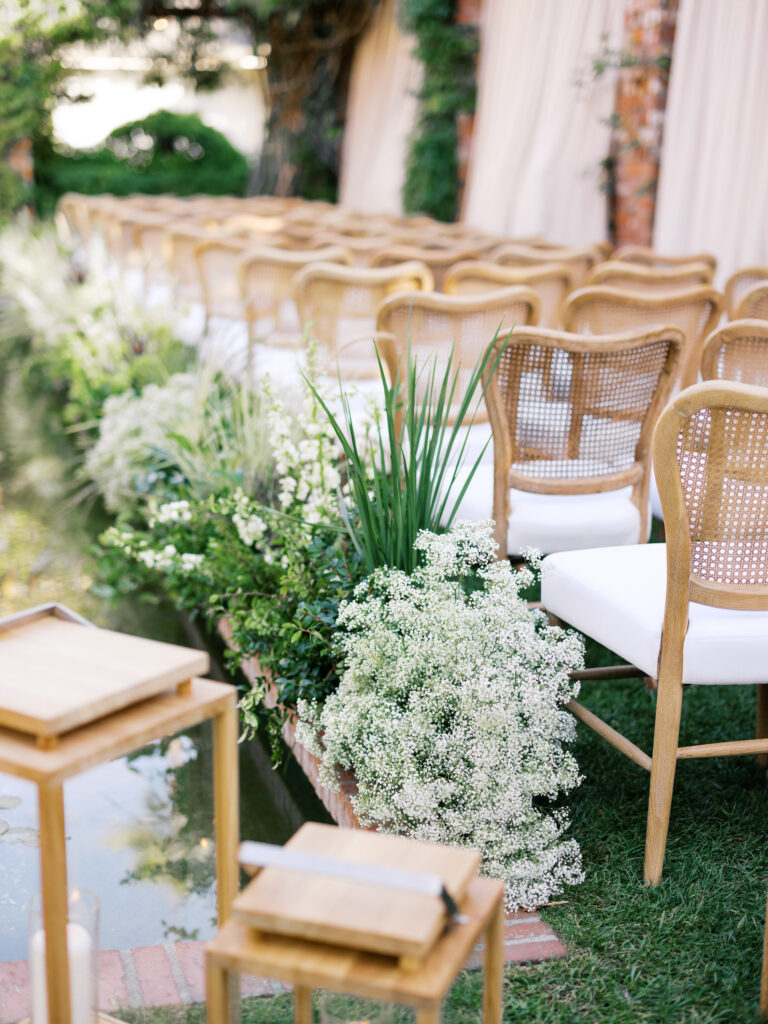 floral aisle at quiet luxury wedding ceremony