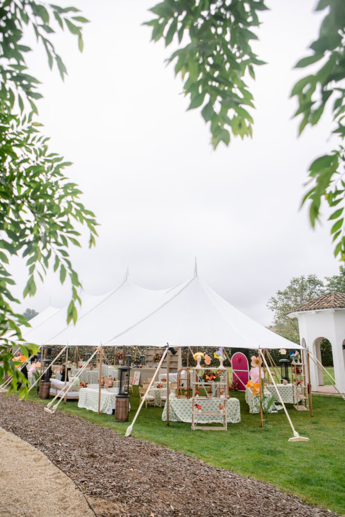 White sailcloth tent in backyard for Kentucky Derby party