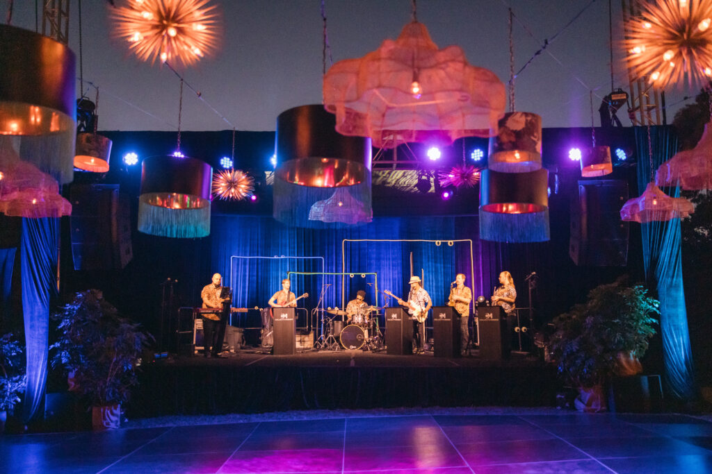 Stage and Dance floor at Gucci Jungle Party with fun lighting and decor