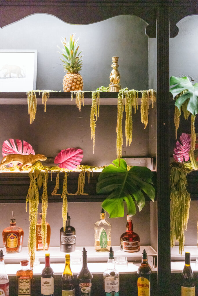 Gucci jungle themed bar shelves at party