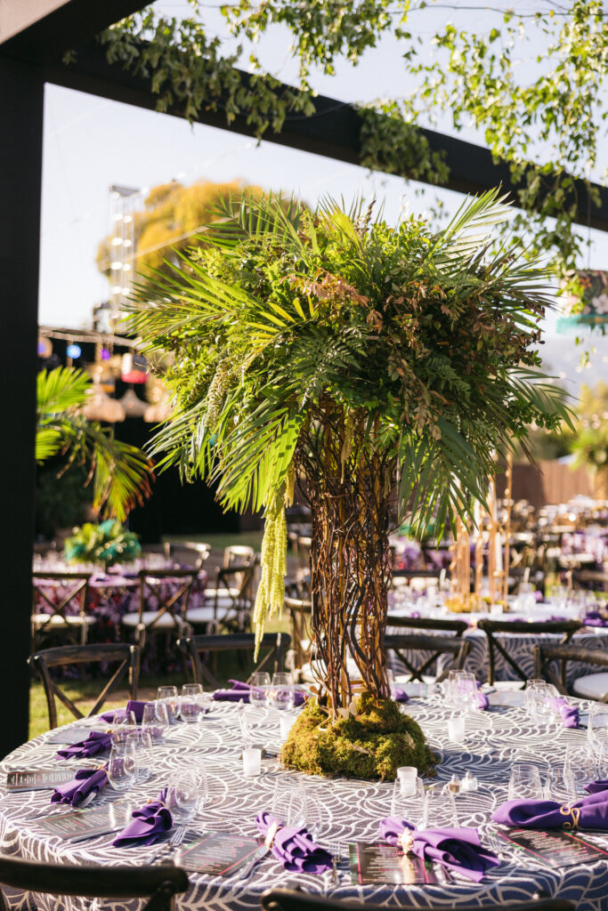 Tablescape with large tall tree-like centerpiece