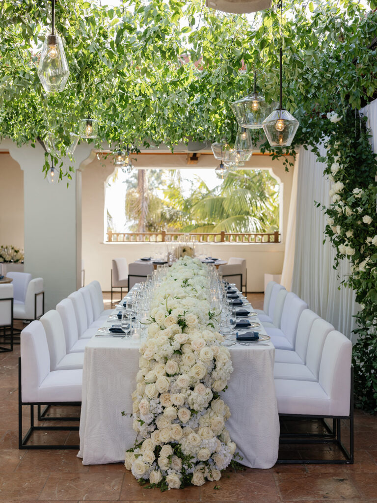 Luxury wedding reception with lush white flowers