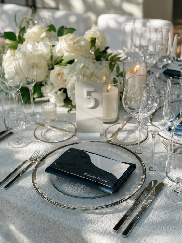 white and navy wedding reception tablescape