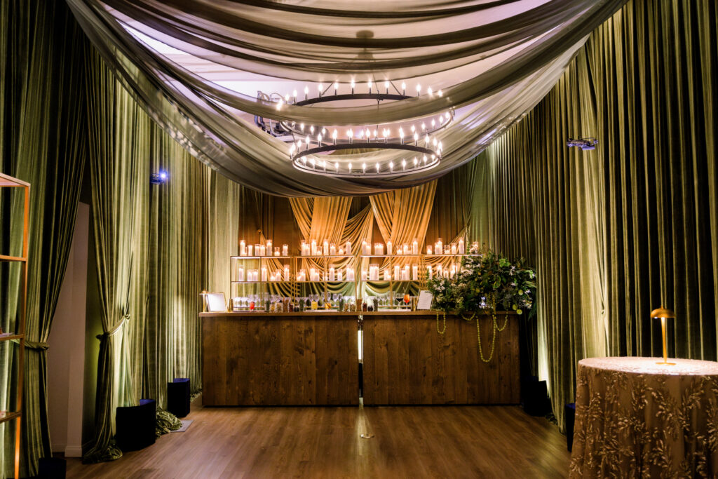 Dramatic green draping at corporate party