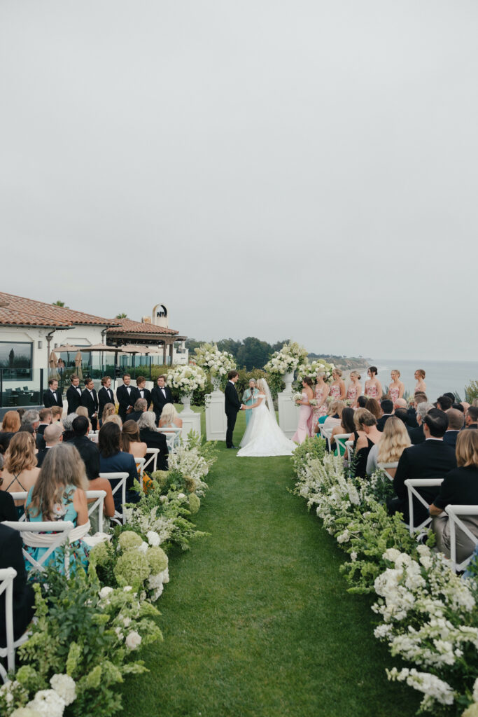 Stylish white and green wedding ceremony at the Ritz Carlton Bacara